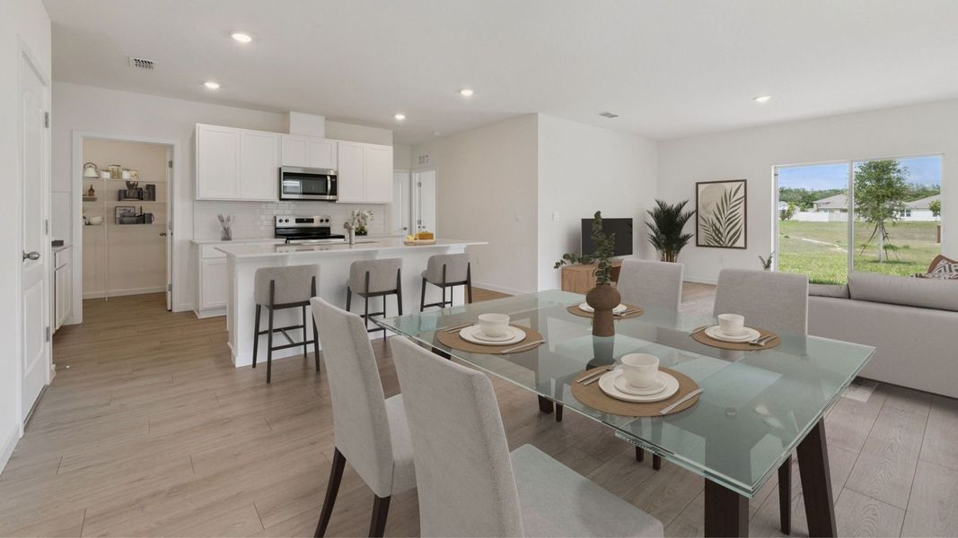 Representative furnished interior of a home built from the Robie by D.R. Horton in Kindred, Kissimmee (Image 4).