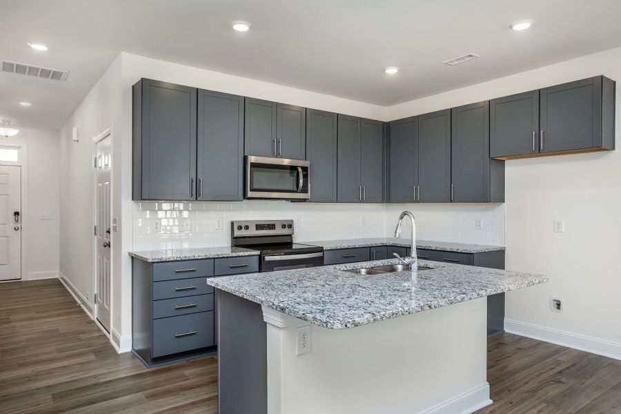 Furnished interior view inside a new home in 1158 Place Townhomes, Wilson (Image 8).