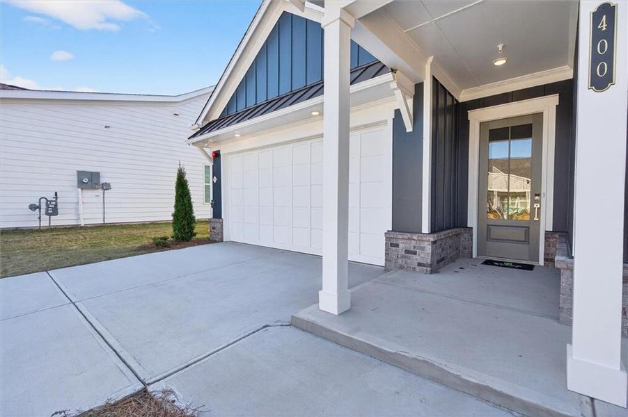 Exterior details and patio area of a home in The Reserve at Bells Ferry, Kennesaw (Image 20).