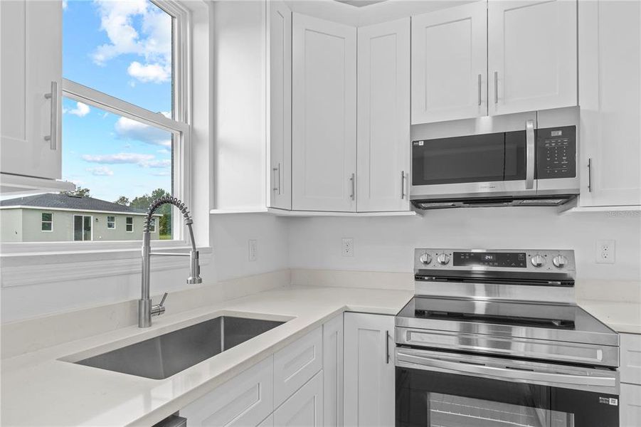 Furnished interior view inside a new home in , Summerfield (Image 5).