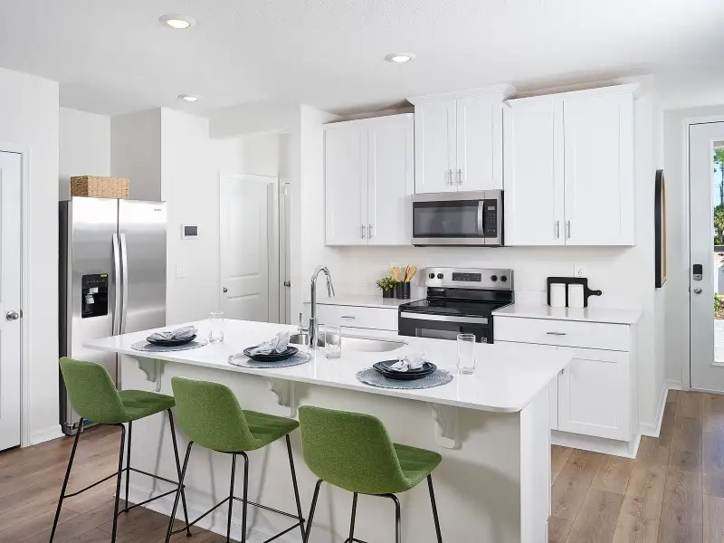 Furnished interior view inside a new home in Bradford Park, Ormond Beach (Image 3).