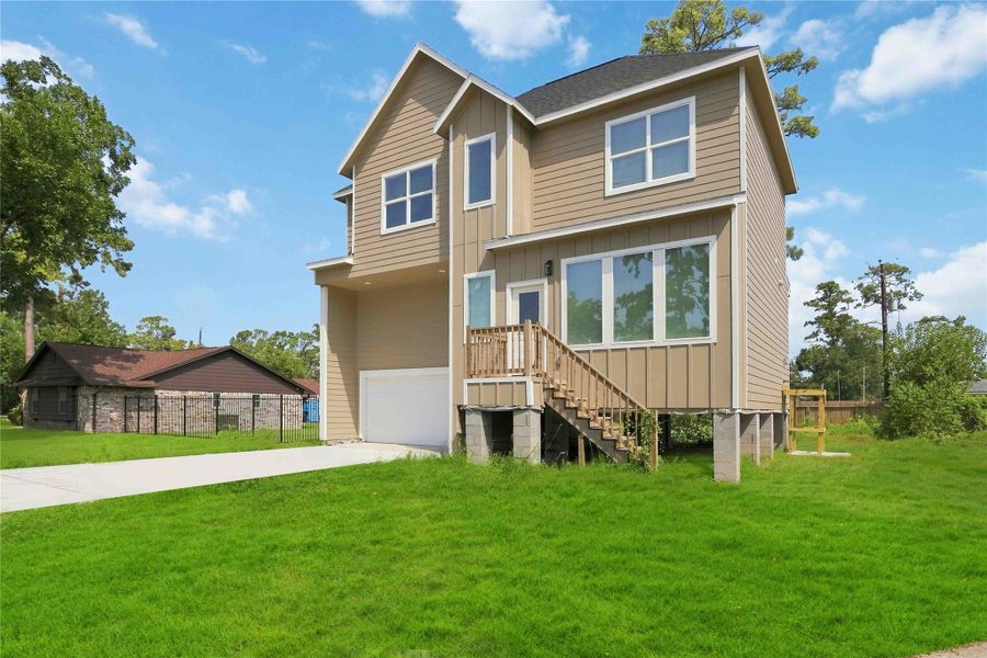 Front exterior of a new home in , Houston, TX, highlighting curb appeal (Image 1). Front exterior of a new home in , Houston, TX, highlighting curb appeal (Image 1).