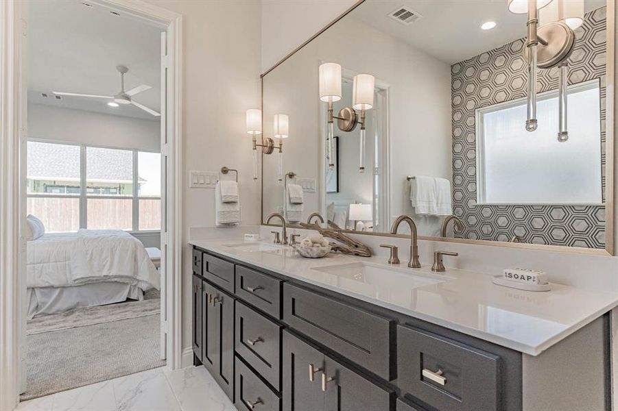 Custom cabinetry, dual vanities and designer fittings Custom cabinetry, dual vanities and designer fittings