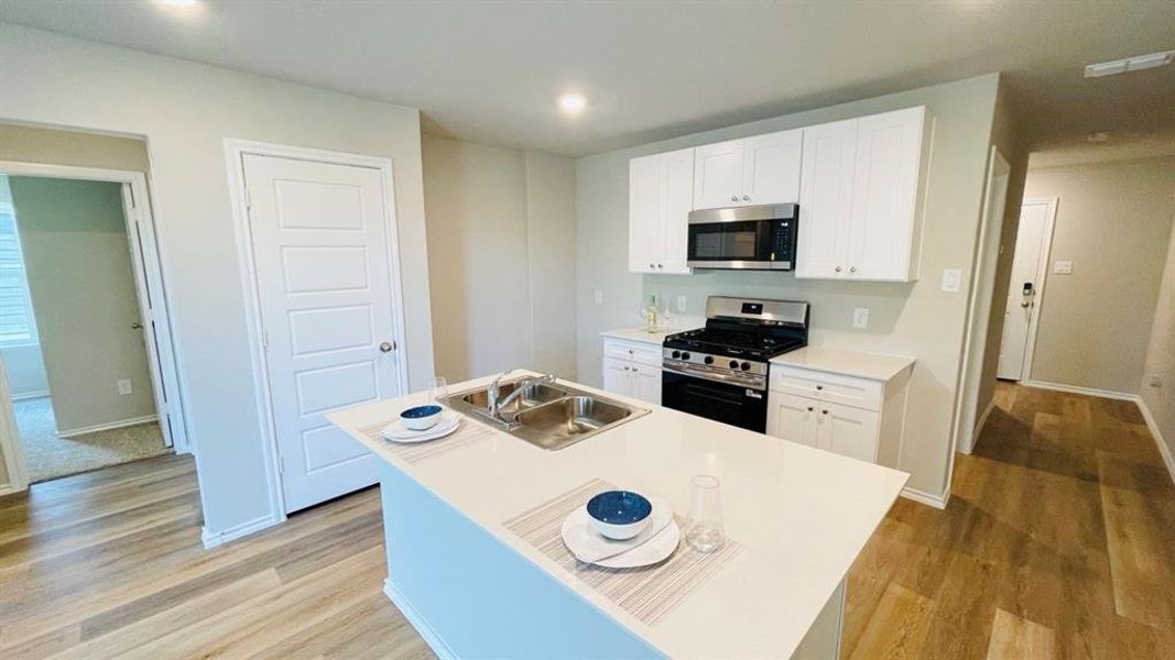 Furnished interior view inside a new home in Sunnycreek, Crowley (Image 9).