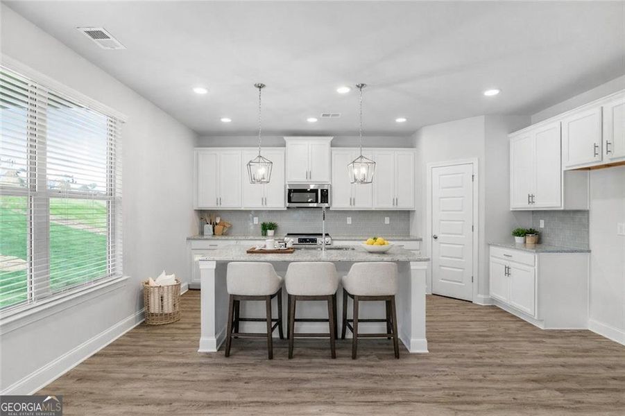 Furnished interior view inside a new home in , Gray (Image 6).