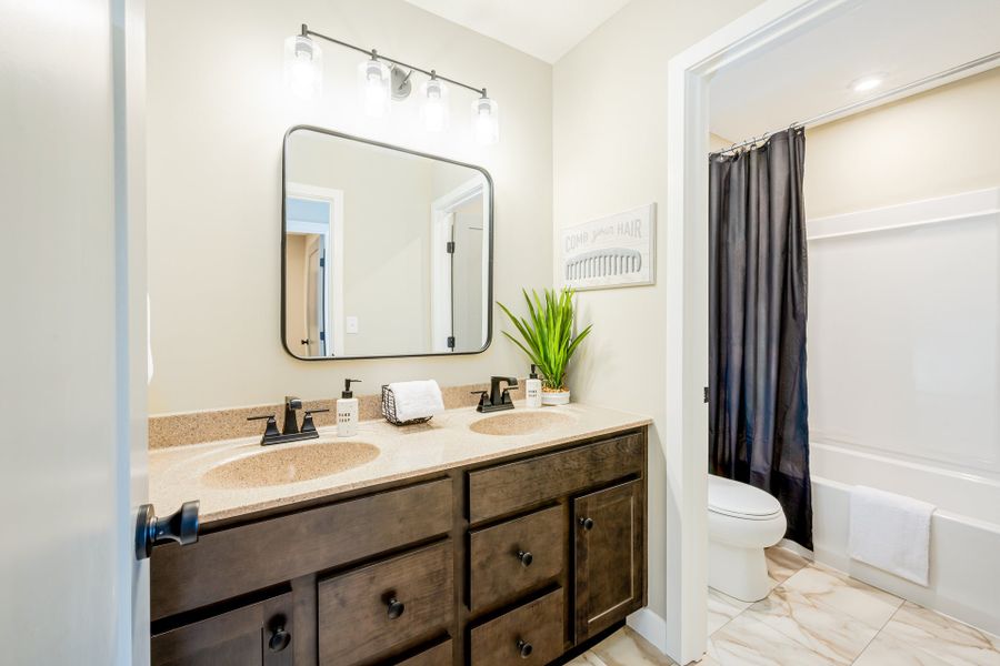 Representative furnished interior of a home built from the Wyatt by Fischer Homes in Twin Lakes, Hoschton (Image 28).