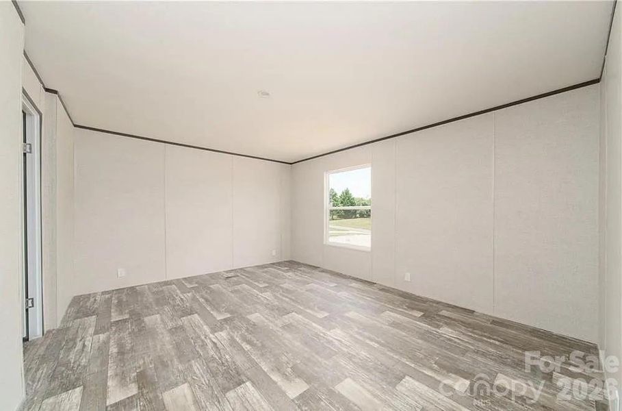Spacious, unfurnished interior of a new home in , Lenoir (Image 9).