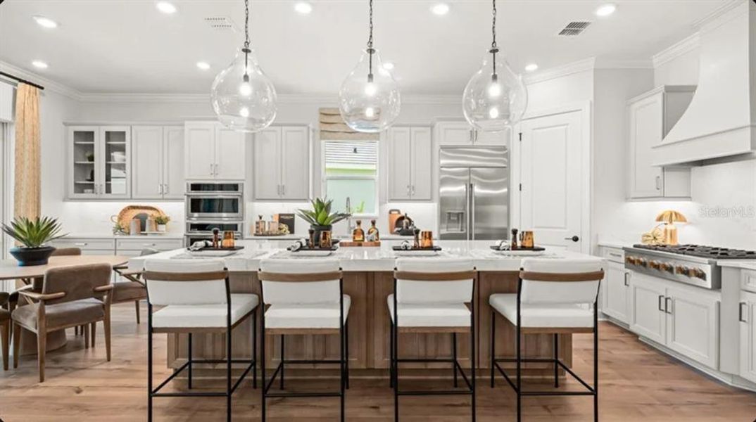 Furnished interior view inside a new home in Esplanade at Wellen Park, Englewood (Image 3).