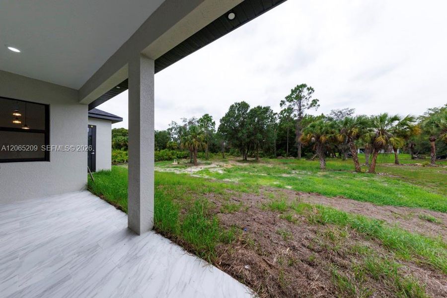 Exterior details and patio area of a home in , Lehigh Acres (Image 36).