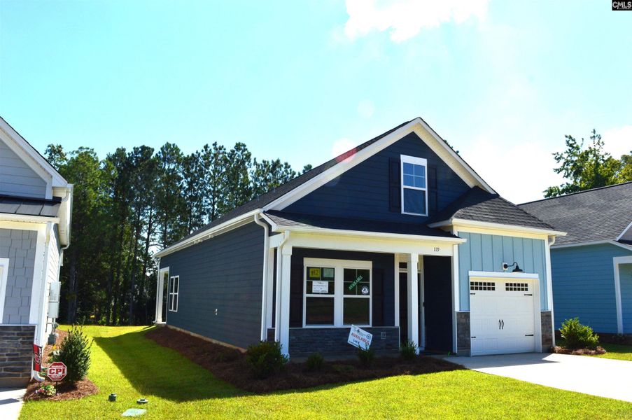 Front exterior of a new home in Bickley Station, Irmo, SC, highlighting curb appeal (Image 17).