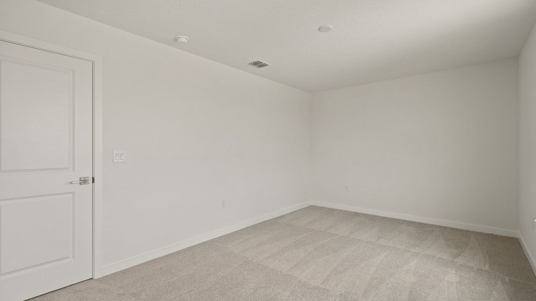 Comfortable second bedroom with roomy walk-in closet—ideal for guests, kids, or a personalized private retreat