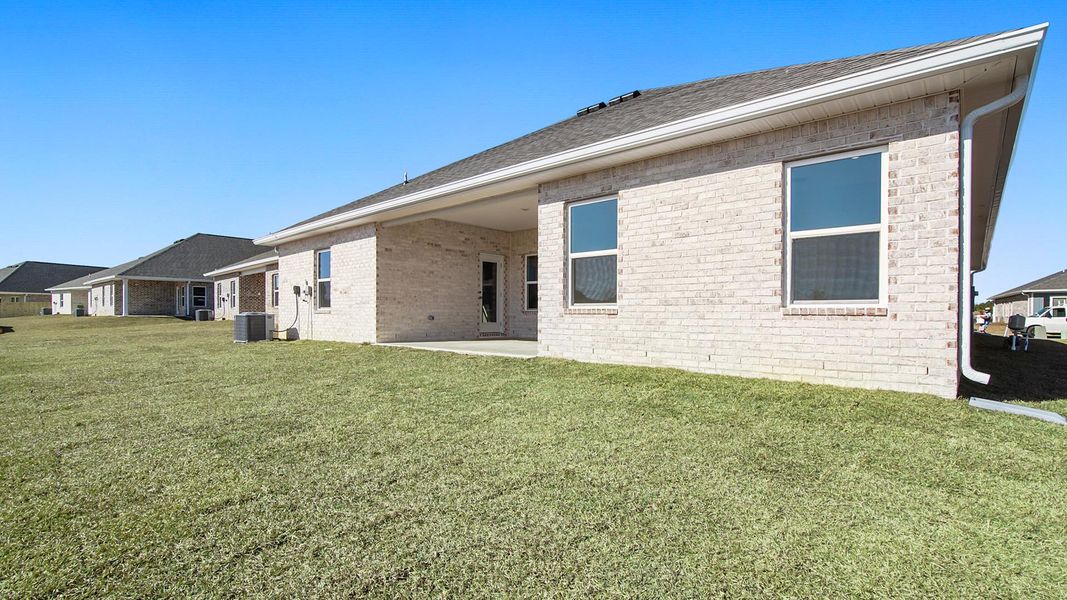 Exterior details and patio area of a home in Owl's Head Farms, Freeport (Image 2).