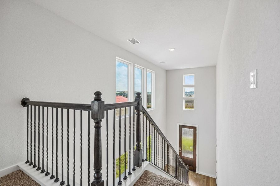 Spacious, unfurnished interior of a new home in The Meadows at Hunters Ranch, San Antonio (Image 34).