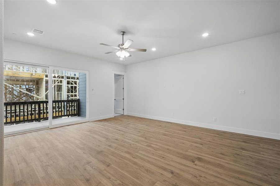 Unfurnished room with a ceiling fan, recessed lighting, and light wood-style flooring