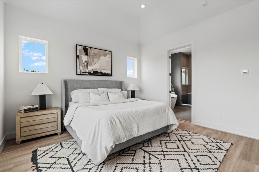 Plenty of space here for a king-size bed and nightstands, with a peek into your designer-inspired ensuite bath just steps away. Plenty of space here for a king-size bed and nightstands, with a peek into your designer-inspired ensuite bath just steps away.