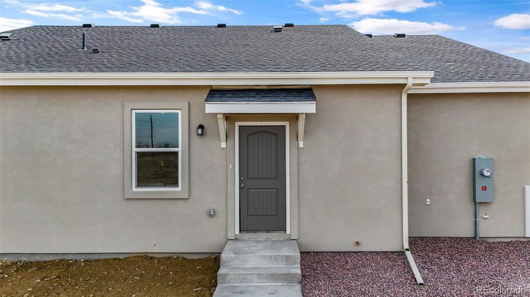 Exterior details and patio area of a home in , Pueblo West (Image 3).