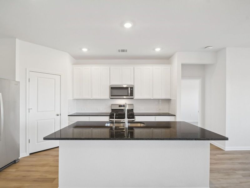 Furnished interior view inside a new home in Waterstone Crossing, Kyle (Image 5).