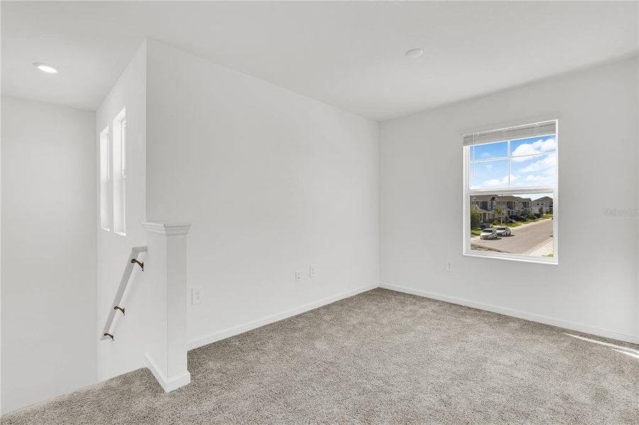 Spacious, unfurnished interior of a new home in Cascades: Grand Collection, Davenport (Image 8).