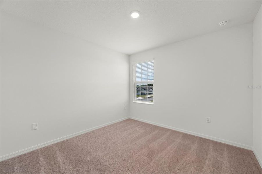 Spacious, unfurnished interior of a new home in Tula Parc, Astatula (Image 48).