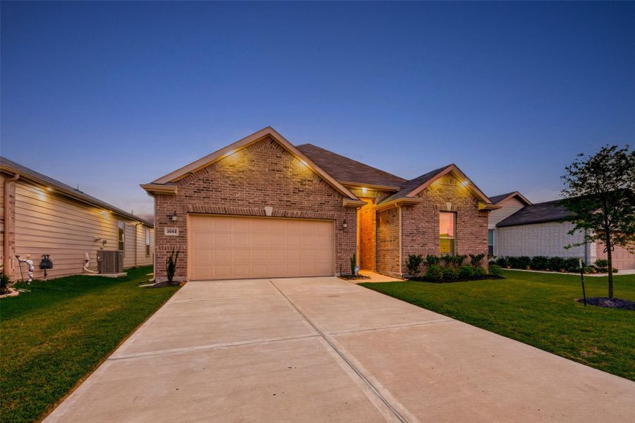 Front exterior of a new home in , Fresno, TX, highlighting curb appeal (Image 23).