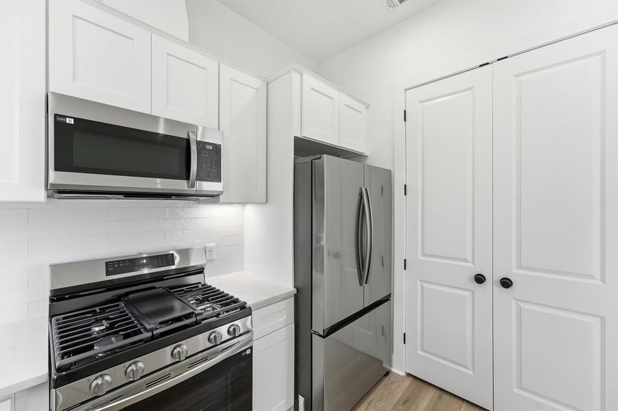 Everything you need is already here. A full stainless appliance package with gas range, over-the-range microwave, and French door refrigerator means you can move in and start living from day one. Everything you need is already here. A full stainless appliance package with gas range, over-the-range microwave, and French door refrigerator means you can move in and start living from day one.