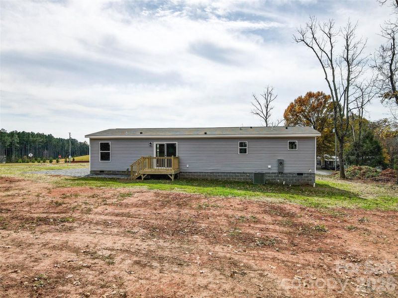Exterior details and patio area of a home in , Harmony (Image 17).