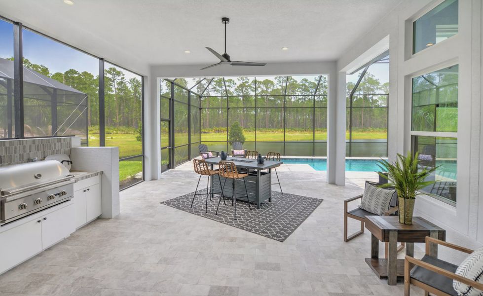 Exterior details and patio area of a home in Plantation Bay, Ormond Beach (Image 23).