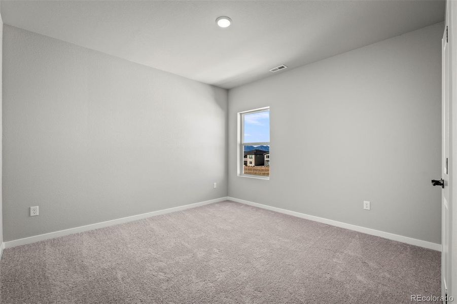 Spacious, unfurnished interior of a new home in Revel Crossing at Wolf Ranch – The Outlook Collection, Colorado Springs (Image 29).