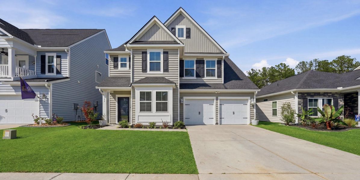Front exterior of a new home in Cypress Preserve, Moncks Corner, SC, highlighting curb appeal (Image 1). Front exterior of a new home in Cypress Preserve, Moncks Corner, SC, highlighting curb appeal (Image 1).