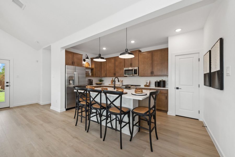 Kitchen with pendant lighting and gorgeous countertops