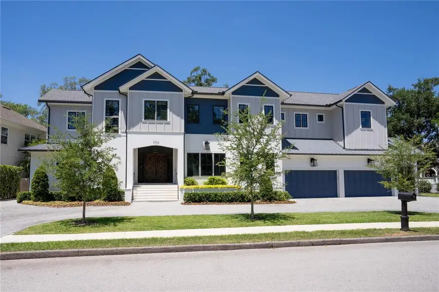 Front exterior of a new home in , Tampa, FL, highlighting curb appeal (Image 24).
