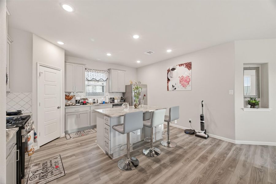 Furnished interior view inside a new home in Sunterra, Katy (Image 17).
