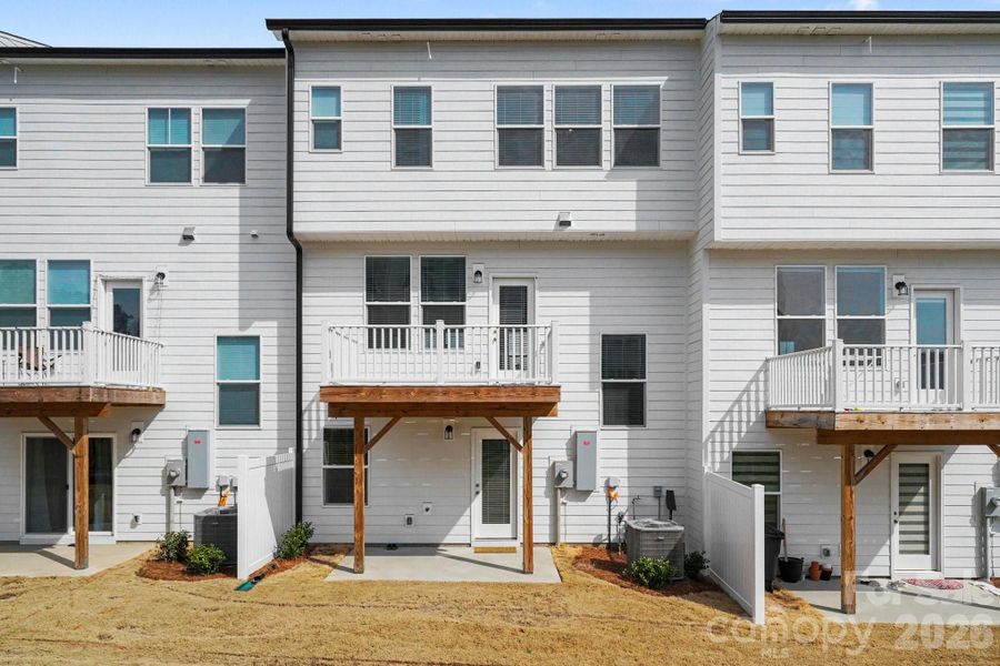 Exterior details and patio area of a home in Christenbury Greene, Concord (Image 22).