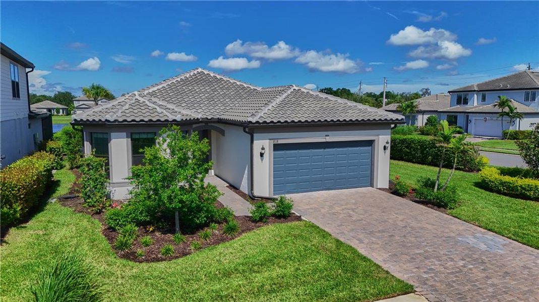 Front exterior of a new home in , Bradenton, FL, highlighting curb appeal (Image 2). Front exterior of a new home in , Bradenton, FL, highlighting curb appeal (Image 2).