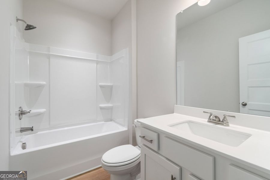 Furnished interior view inside a new home in Rosewood Lake Estates, Hoschton (Image 14).