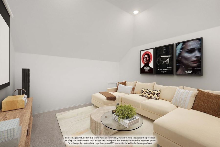 Media room with vaulted ceiling, projection screen, sectional sofa, and three framed movie posters on the wall Media room with vaulted ceiling, projection screen, sectional sofa, and three framed movie posters on the wall