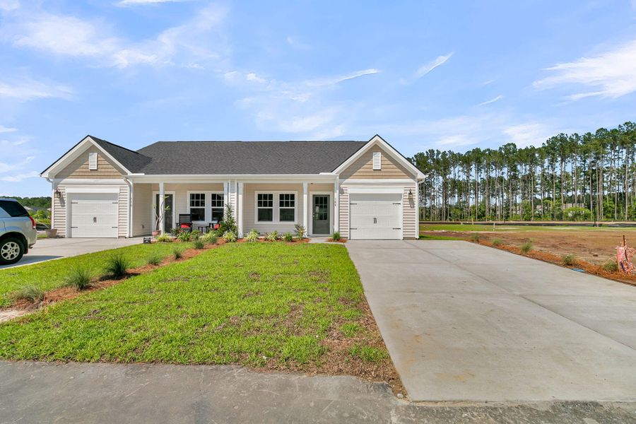 Front exterior of a new home in , Summerville, SC, highlighting curb appeal (Image 20).