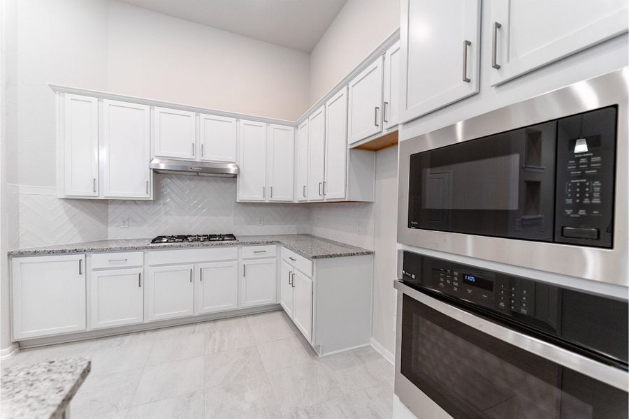 Furnished interior view inside a new home in Creekhaven, Iowa Colony (Image 3).