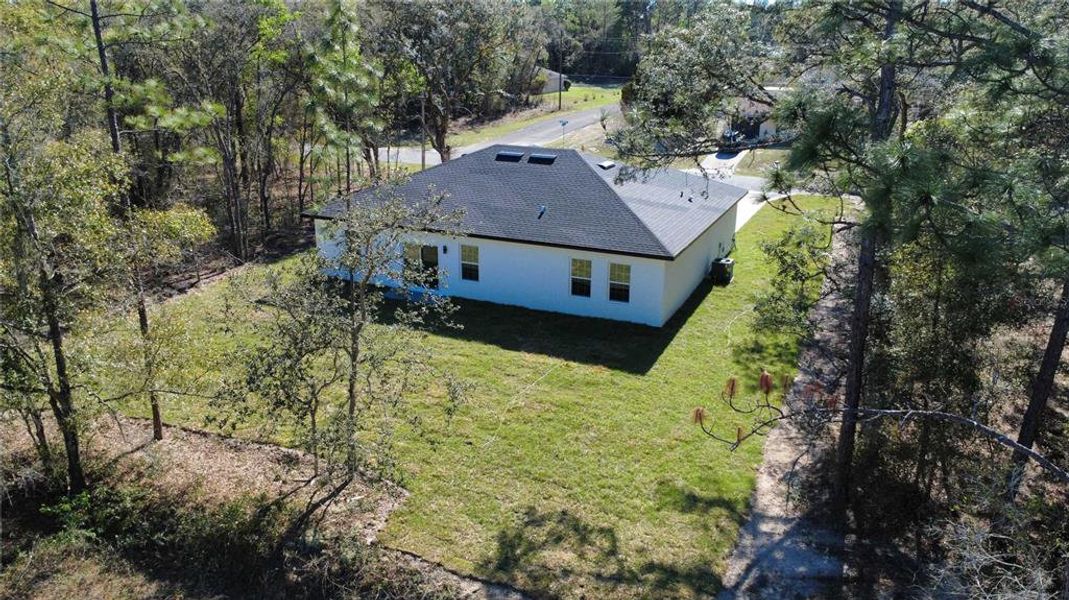 Exterior details and patio area of a home in , Citrus Springs (Image 20).