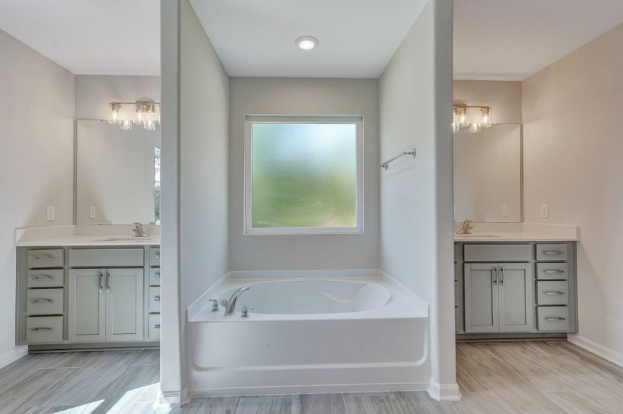 Representative furnished interior of a home built from the The Stonecrest by Smith Family Homes in Ramsey Landing, Rincon (Image 20).