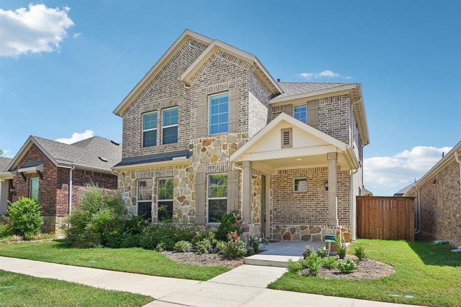 Front exterior of a new home in , Garland, TX, highlighting curb appeal (Image 1). Front exterior of a new home in , Garland, TX, highlighting curb appeal (Image 1).