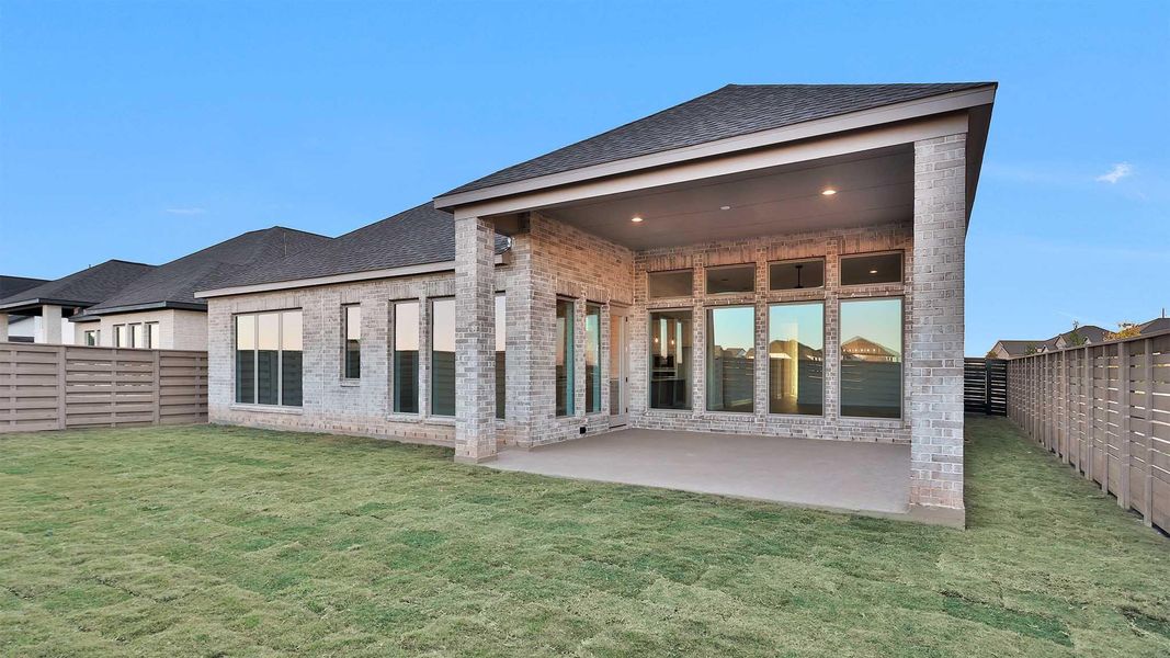 Exterior details and patio area of a home in Austin Point 60', Richmond (Image 2).
