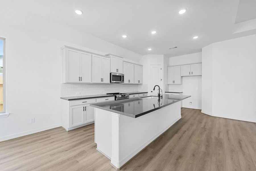 Furnished interior view inside a new home in Oakwood Estates, Waller (Image 5).