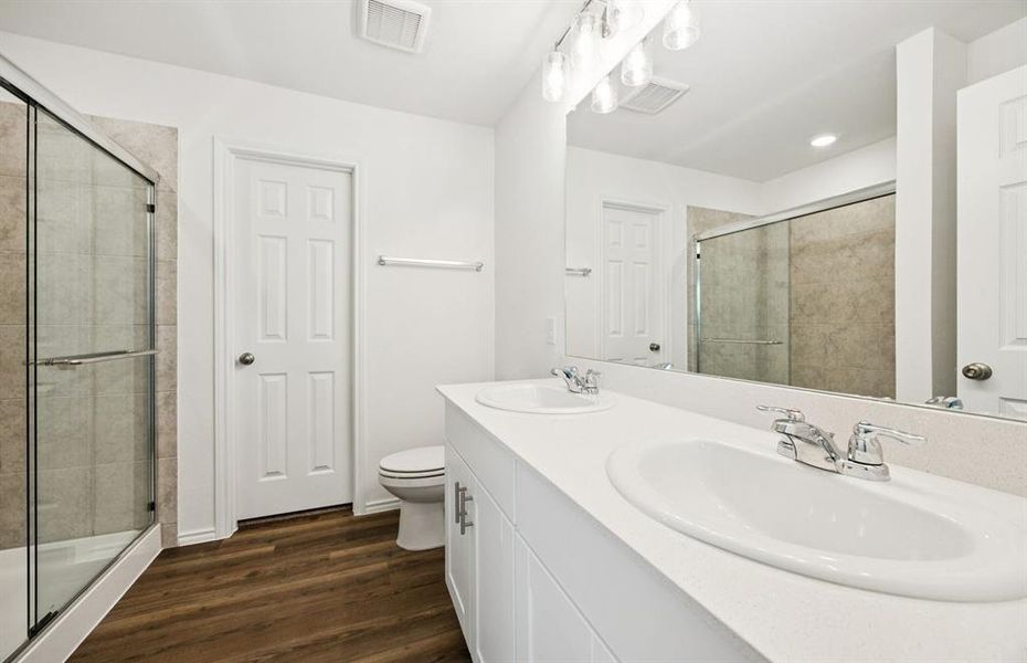 Owner's private bath with double vanity