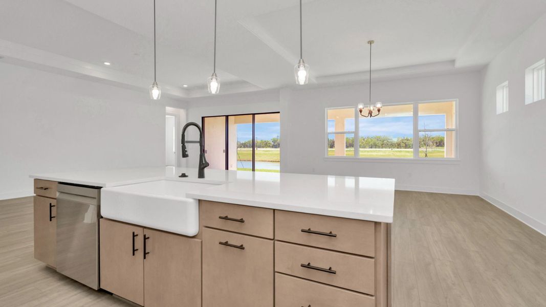 The Kitchen of a DRB Homes Grand Hawk which is offered as a home plan at Serengeti in Spring Hill, FL.