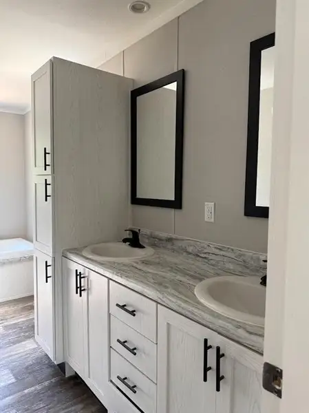 Furnished interior view inside a new home in , Pelican Bay (Image 4).