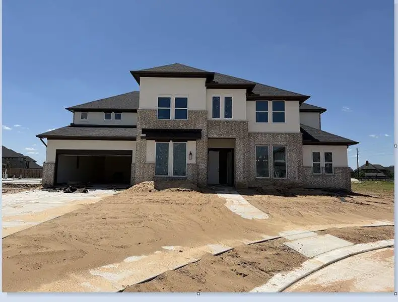 In-progress construction of a new home in Harvest Green, Richmond, TX (Image 4).