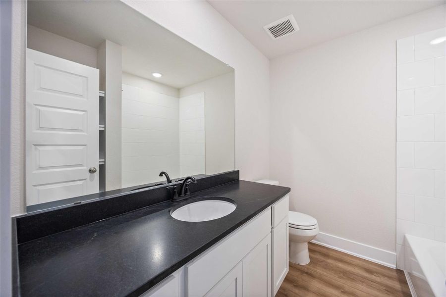 Furnished interior view inside a new home in Alicante, Houston (Image 7).