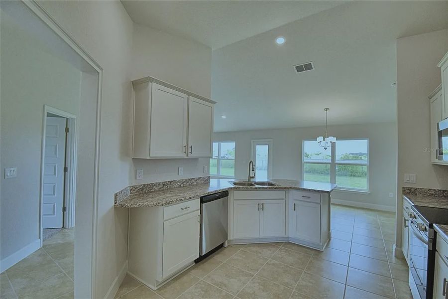Furnished interior view inside a new home in Cadence Crossing, Auburndale (Image 5).