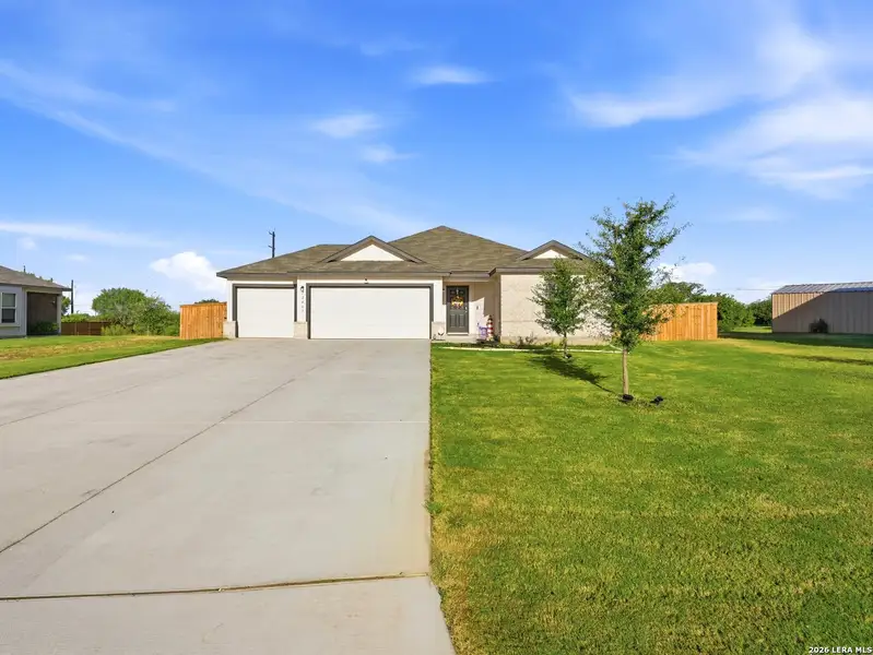 Front exterior of a new home in Summer Hills, Atascosa, TX, highlighting curb appeal (Image 25).